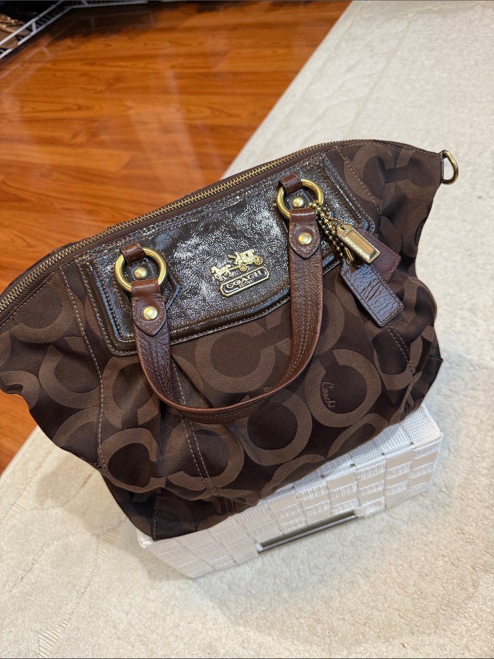 Coach Signature jacquard satchel handbag with leather trim and gold-tone hardwar